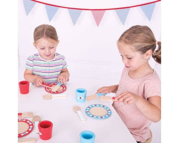Dinner Service (20 Pieces) Budding young cooks can host their own dinner and tea parties and cook up some amazing meals and treats with this brightly coloured wooden Pink Dinner Service Set. Age 3+ years. BigJigs